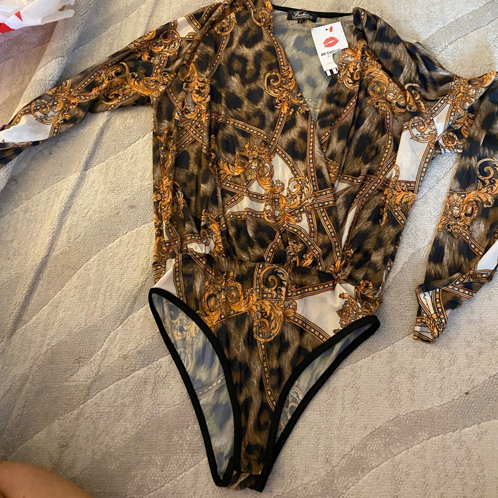 bodysuit size large animal print plus gold detailing